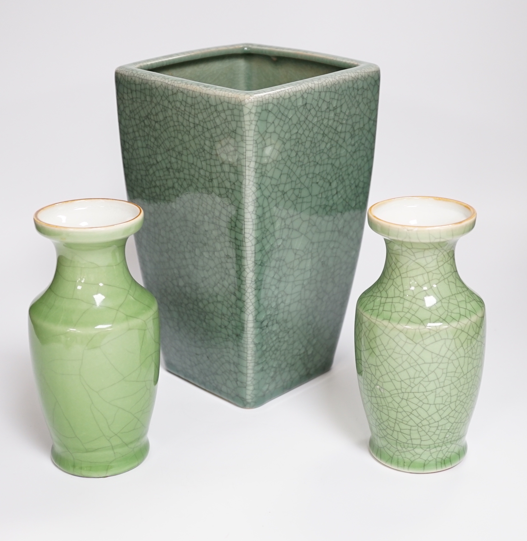 A Korean green glazed crackleware vase and two similar Chinese vases, Korean vase 23cm high